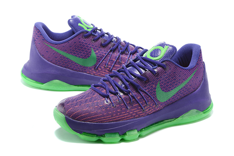 purple and green nike shoes